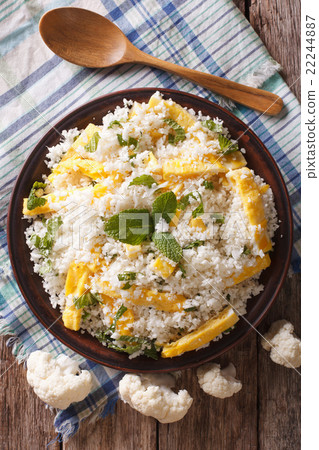 Cauliflower rice with scrambled eggs and herbs  22244887