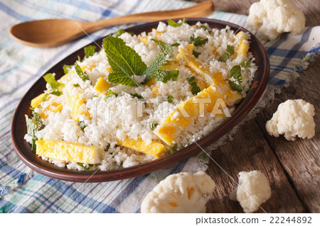 Cauliflower rice with scrambled eggs and mint 22244892