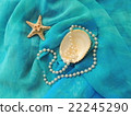Sea shell with pearl beads composition on turquoise pareo. 22245290