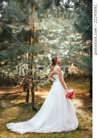 Bride in park outdoors 22245691