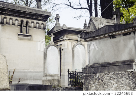 Tombstones in cemetery at dusk, gothic style Tombstones in cemetery at dusk, gothic style 22245698