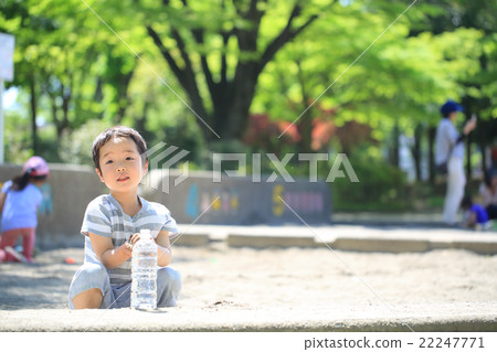 Infant playing sandbox Infant playing sandbox 22247771