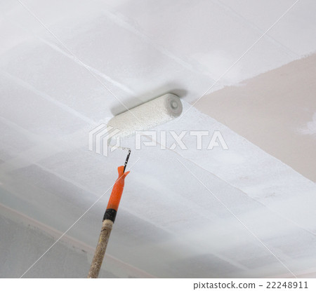 painting a gypsum plaster ceiling with roller 22248911