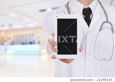 doctor showing tablet computer blank screen  22249135