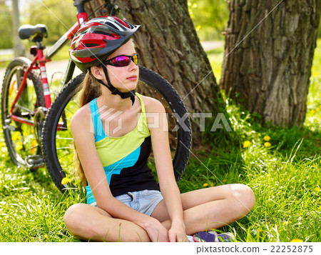 Bikes cycling girl wearing helmet have a rest 22252875