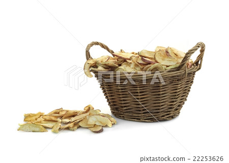 Dried Apples Slice In Wicker Basket Isolated  22253626