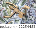 Wooden Human Figurine On The Dollar Cash  22254483