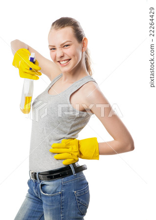 Young woman with cleansing spray isolated on white 22264429