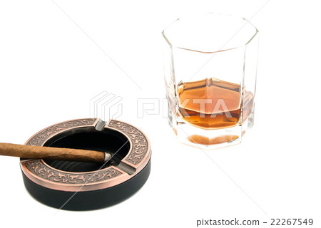 cigarillo in ashtray and whiskey on white 22267549