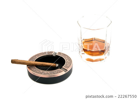 cigarillo in ashtray and whiskey 22267550