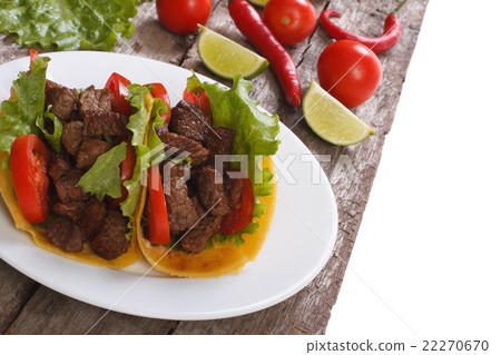 Mexican fast food: tacos stuffed with meat Mexican fast food: tacos stuffed with meat 22270670