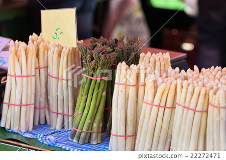 Fresh asparagus selling in a farmers market Fresh asparagus selling in a farmers market 22272471