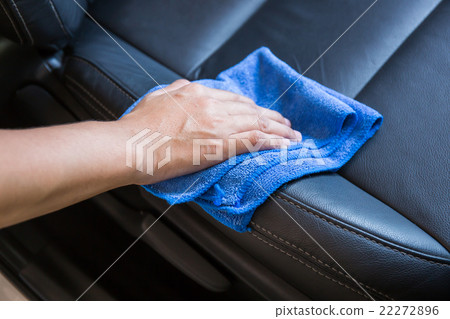 Hand with microfiber cloth cleaning Interior car Hand with microfiber cloth cleaning Interior car 22272896