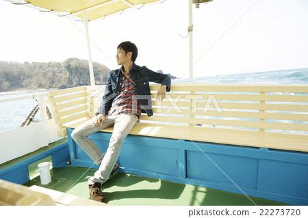 Men enjoying the view from the ship 22273720