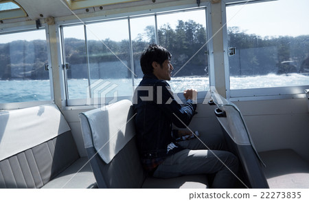 Men enjoying the view from the ship Men enjoying the view from the ship 22273835