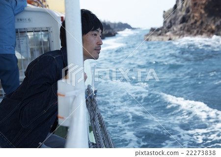 Men enjoying the view from the ship Men enjoying the view from the ship 22273838