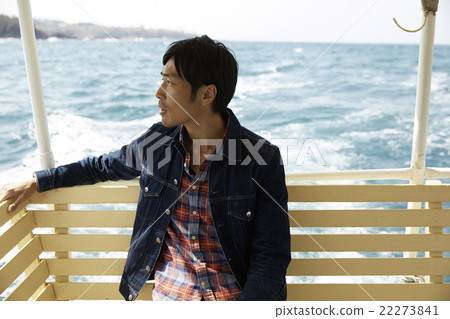Men enjoying the view from the ship 22273841