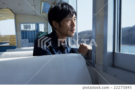 Men enjoying the view from the ship 22273845
