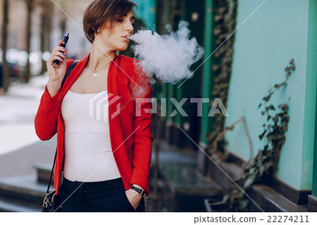 girl with the electronic cigarette 22274211