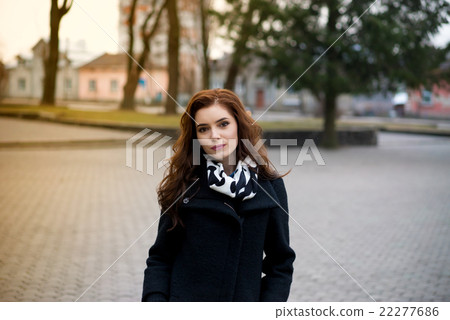 Beautiful girl in the autumn park 22277686