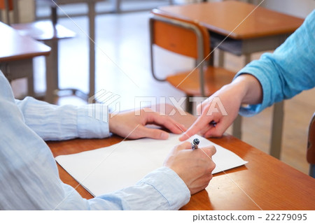 Students receiving guidance from teachers during self-study Students receiving guidance from teachers during self-study 22279095