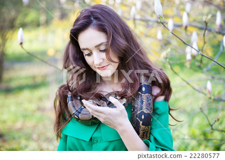 Attracrive girl with python 22280577