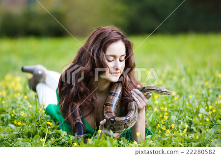 Attracrive girl with python 22280582