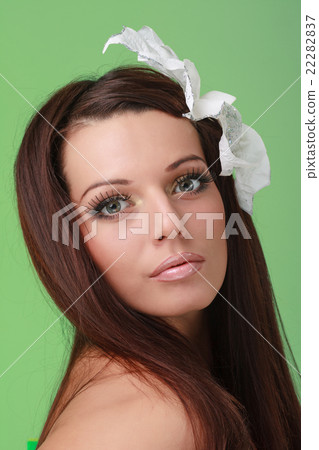 Adult woman with beautiful face and white flowers 22282837