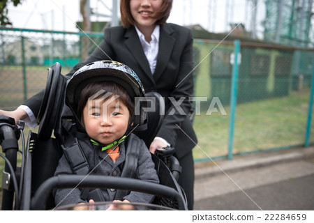 Taking a child on a bicycle Taking a child on a bicycle 22284659