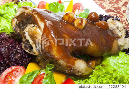 roasted pork knuckle with vegetables 22288404