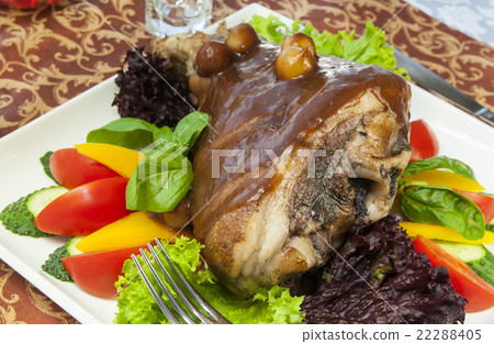 roasted pork knuckle with vegetables 22288405