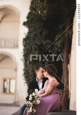 Happy wedding couple, groom, bride with pink dress 22289954