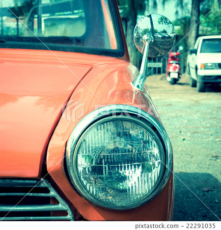 close-up headlight of colourful classic car close-up headlight of colourful classic car 22291035
