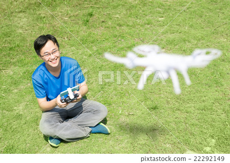 Happy man use drones Happy man use drones 22292149