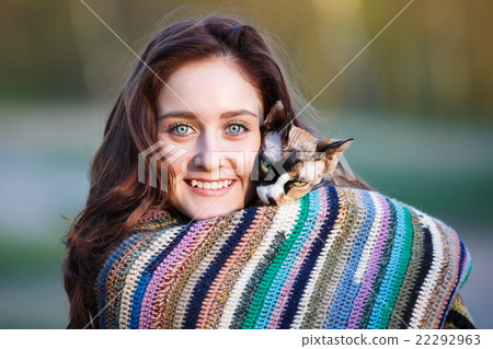 Happy girl with a cat 22292963