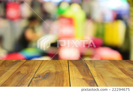 blurred wood table and people in the shopping mal 22294675