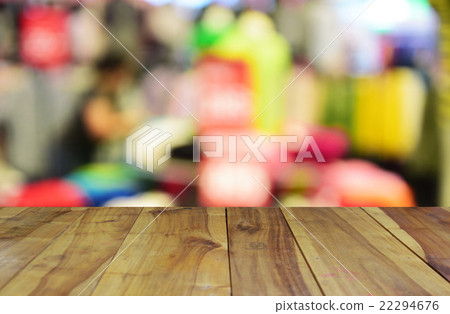blurred wood table and people in the shopping mal 22294676