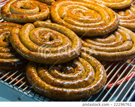 Coil of grilled northern thai spicy sausage 22296761