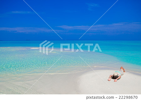 Young woman enjoy tropical beach vacation 22298670