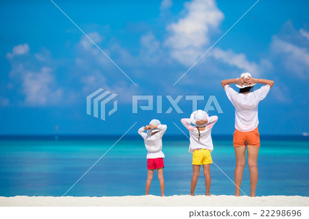 Adorable little girls and young mother on tropical 22298696