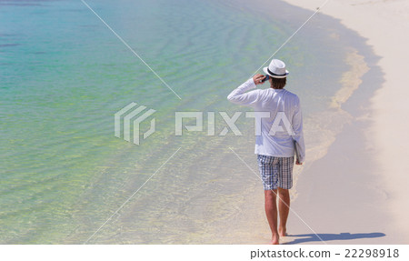 Young business man calling by cell phone on white 22298918