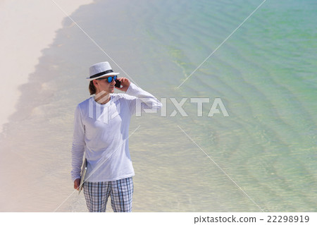 Young business man calling by cell phone on white Young business man calling by cell phone on white 22298919