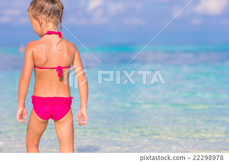 Adorable happy little girl have fun at shallow Adorable happy little girl have fun at shallow 22298978