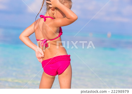 Adorable happy little girl have fun at shallow Adorable happy little girl have fun at shallow 22298979