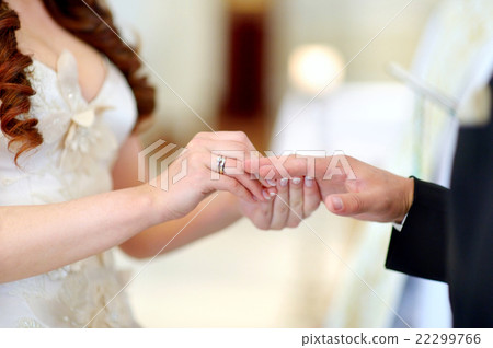 Bride and groom at the church during a wedding Bride and groom at the church during a wedding 22299766