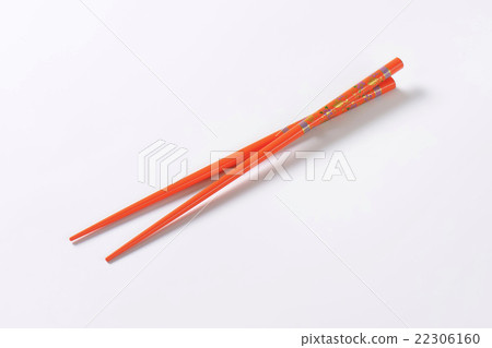 Orange chopsticks with flower pattern Orange chopsticks with flower pattern 22306160