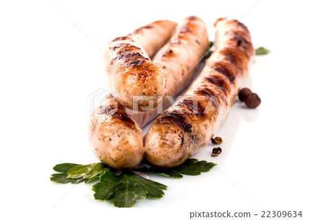 fried pork sausages on a barbecue on a wooden plat 22309634