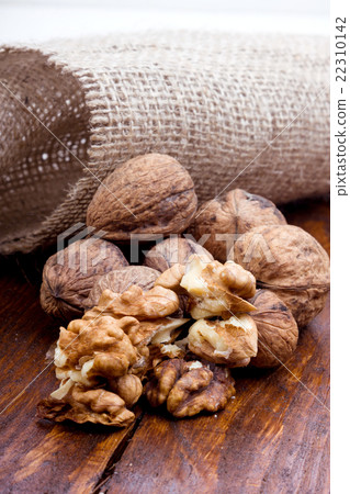 nuts and shells on white table with burlap nuts and shells on white table with burlap 22310142