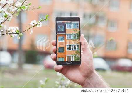 Hand with smartphone taken pictures of multi 22321455