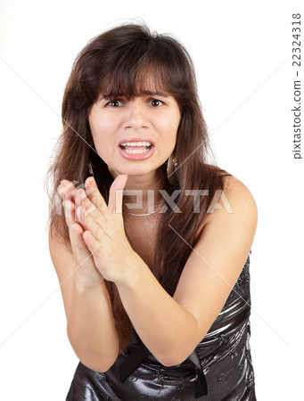 Portrait of a doubtful young woman in gesture of asking with her Portrait of a doubtful young woman in gesture of asking with her 22324318